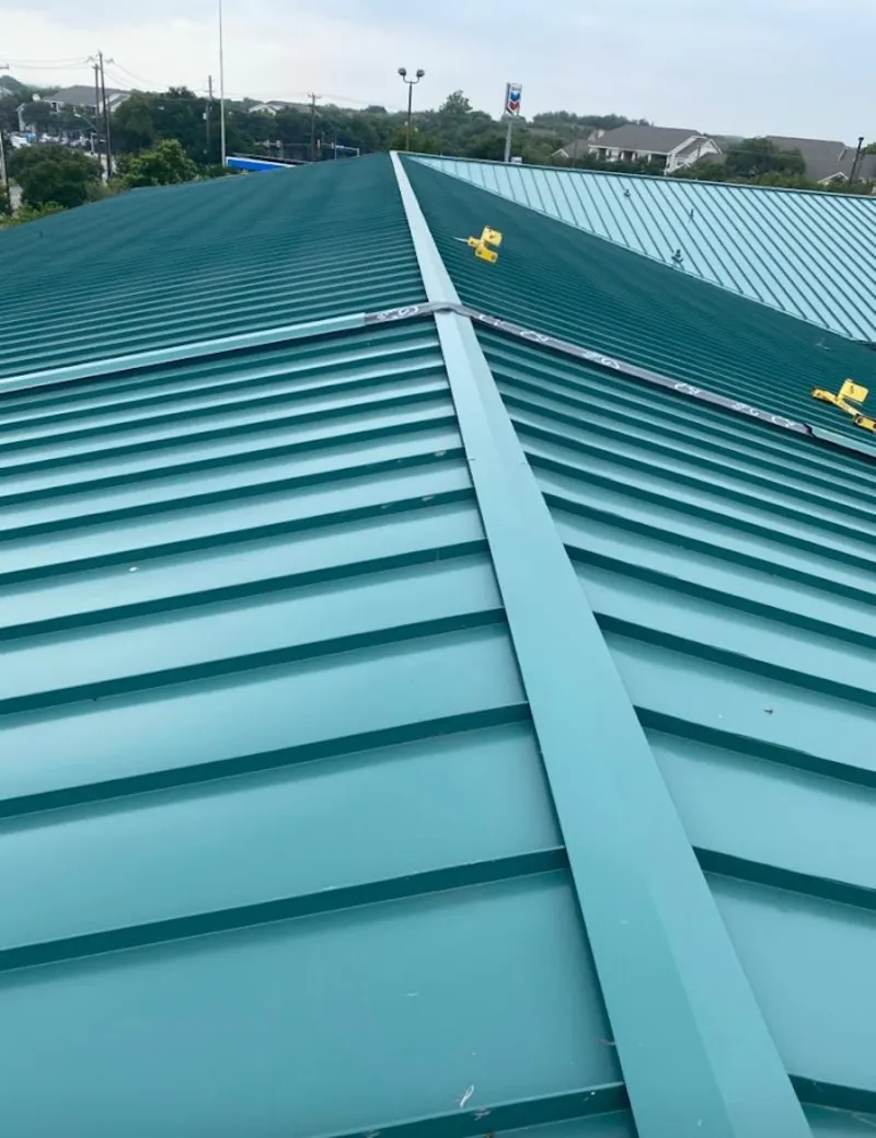 Green commercial metal roof ridge and valley for Metal Roof Repair in Placerville